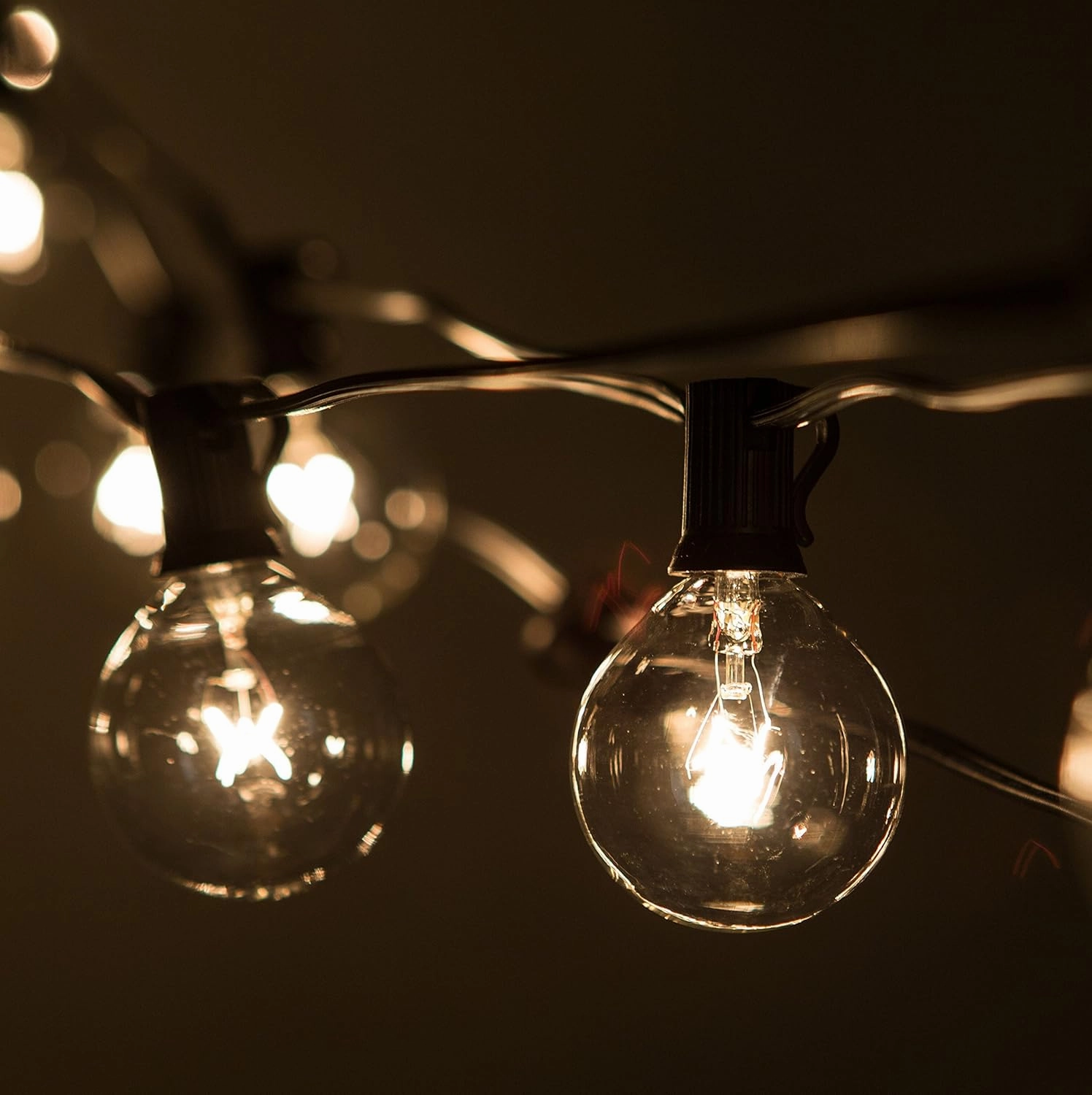 Hometown Evolution, Inc. 25’ G50 Globe Patio String Lights with Clear 2” Light Bulbs and Black Wire (  1 Free Spare)